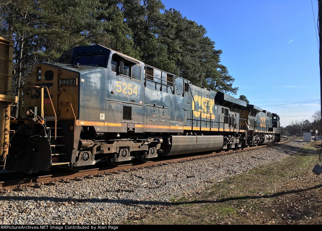 CSX 5254 and 201 lead a tie train